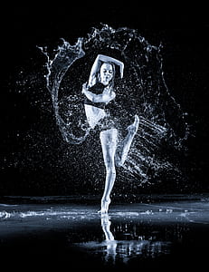 woman dancing with splashing water around her thumbnail
