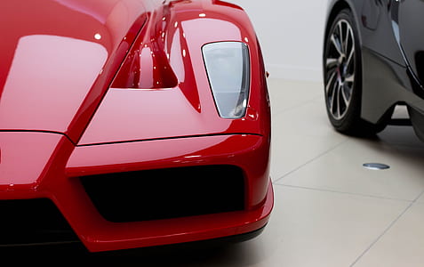 close up photography of red car thumbnail