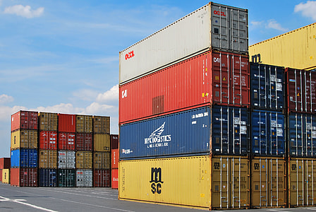 pile of cargo container under cloudy and blue sky at daytime thumbnail