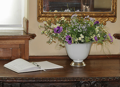 purple poppies in white vase thumbnail