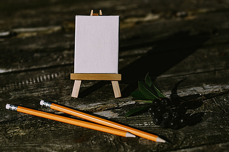 Small flowers, pencils and other things on wood thumbnail