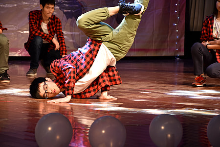 man dancing near balloons thumbnail