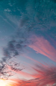 white and orange sky during daytime thumbnail