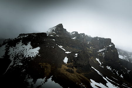mountain covered by snow at daytime thumbnail