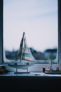 sailing boat scale model near window thumbnail