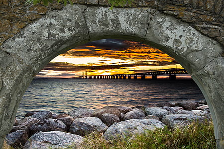 silhouette of bridge during sunset thumbnail