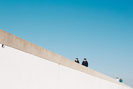 Four Person Wearing Jacket Under White Cloud Blue Skies thumbnail
