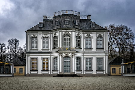 white and black 3-story house thumbnail
