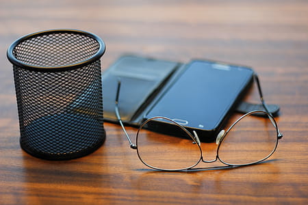 Mobile Phone And Eyeglasses thumbnail