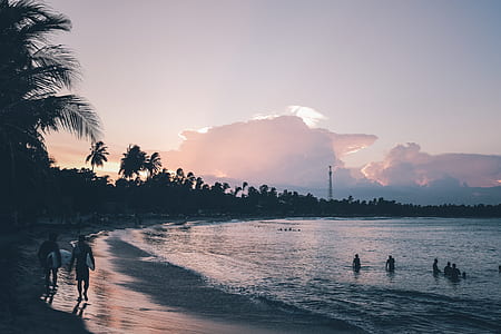 silhouette photography of people at beach thumbnail