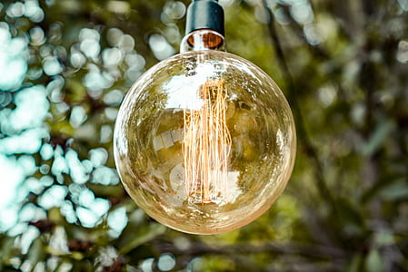 shallow focus photography of light bulb thumbnail