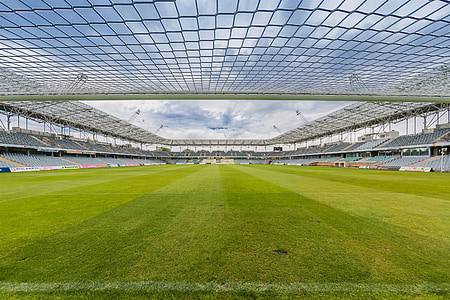 green soccer field at daytime thumbnail