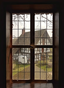 white and black house viewing through window thumbnail