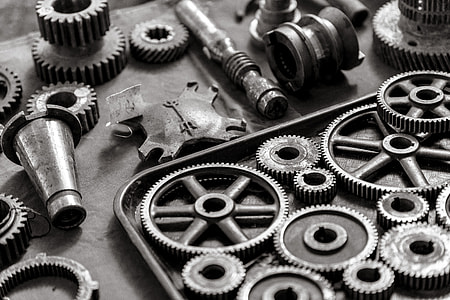 assorted metal gears and tools thumbnail