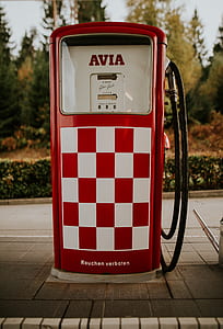 closeup photo of white and red Avia gasoline dispenser thumbnail