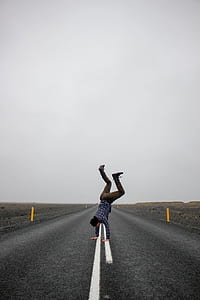 man on hand stand position thumbnail