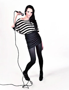 woman holding black corded microphone thumbnail