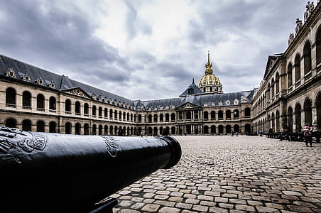 cannon surrounded by buildings thumbnail