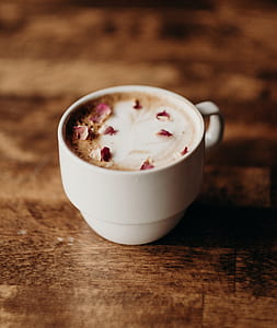 white ceramic mug on brown wooden panel thumbnail