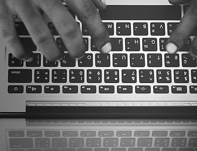 person using gray laptop computer thumbnail