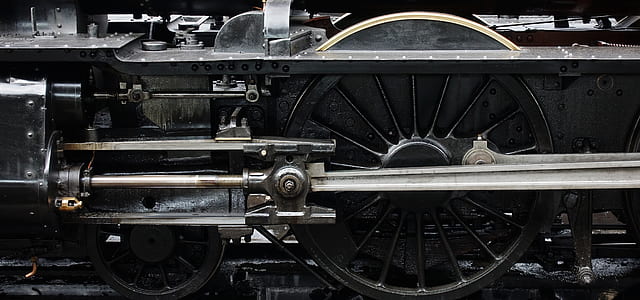 black and gray train wheel at daytime thumbnail
