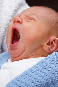 baby in white and blue clothes thumbnail