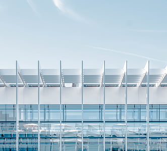 white building under white sky thumbnail