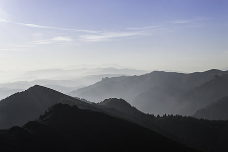 mountain hill under white sky thumbnail