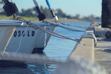 white boat on body of water thumbnail