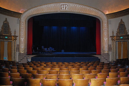 empty chairs on stage interior thumbnail