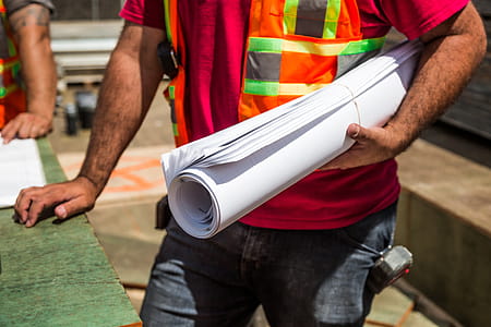 Building Plans In Hand Photo thumbnail