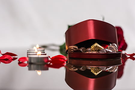 tealight candles beside red box thumbnail