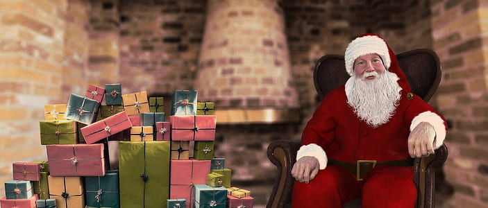 man wearing Santa Claus suit sitting on chair thumbnail