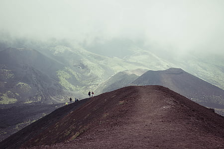 group of people on the mountain during daytime thumbnail