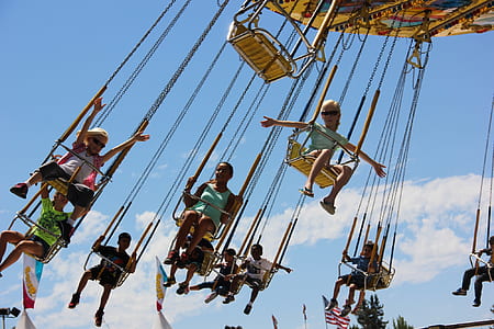 children riding theme park rides thumbnail