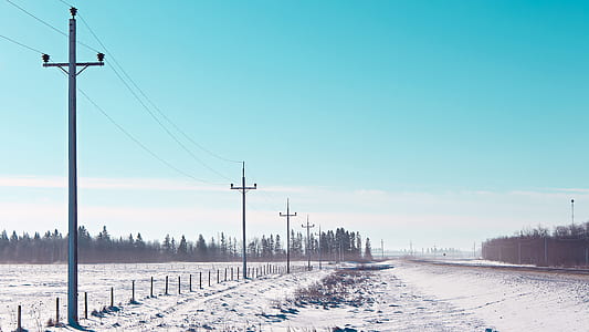 road near utility post at daytime thumbnail