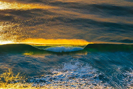 blue body of water waving thumbnail