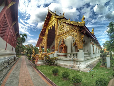 gold and white concrete house thumbnail