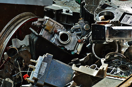pile of mechanical parts at daytime thumbnail