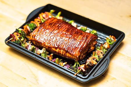 grilled meat on top of black tray thumbnail