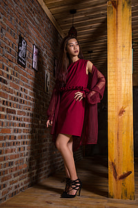 woman wearing red sleeveless mini dress with mesh scarf thumbnail