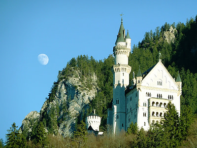 white and green concrete castle near woods thumbnail