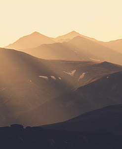 brown mountains under golden hour thumbnail