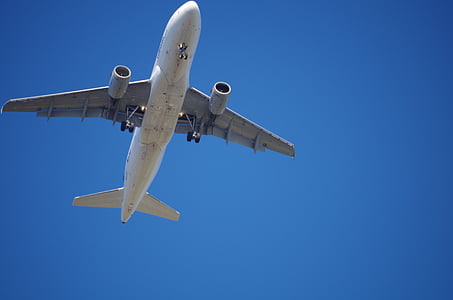 low angle photo of airplane on sky thumbnail