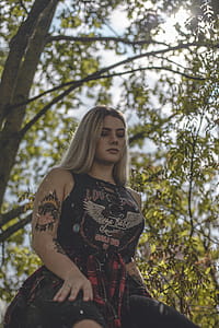 Woman Sitting Under Tree thumbnail