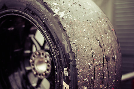 black vehicle wheel and tire in close-up photo thumbnail