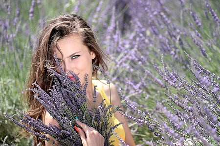 woman holding purple lavender flowers thumbnail