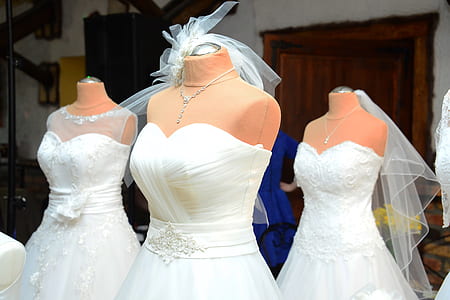 three white dresses on mannequin thumbnail