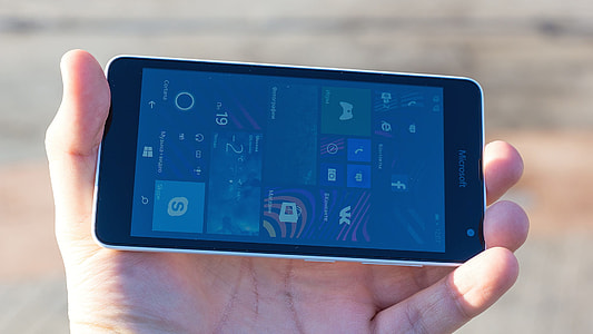 person holding black Microsoft smartphone thumbnail