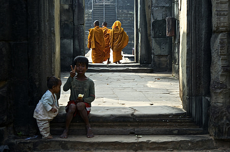 boy sitting near hallway thumbnail